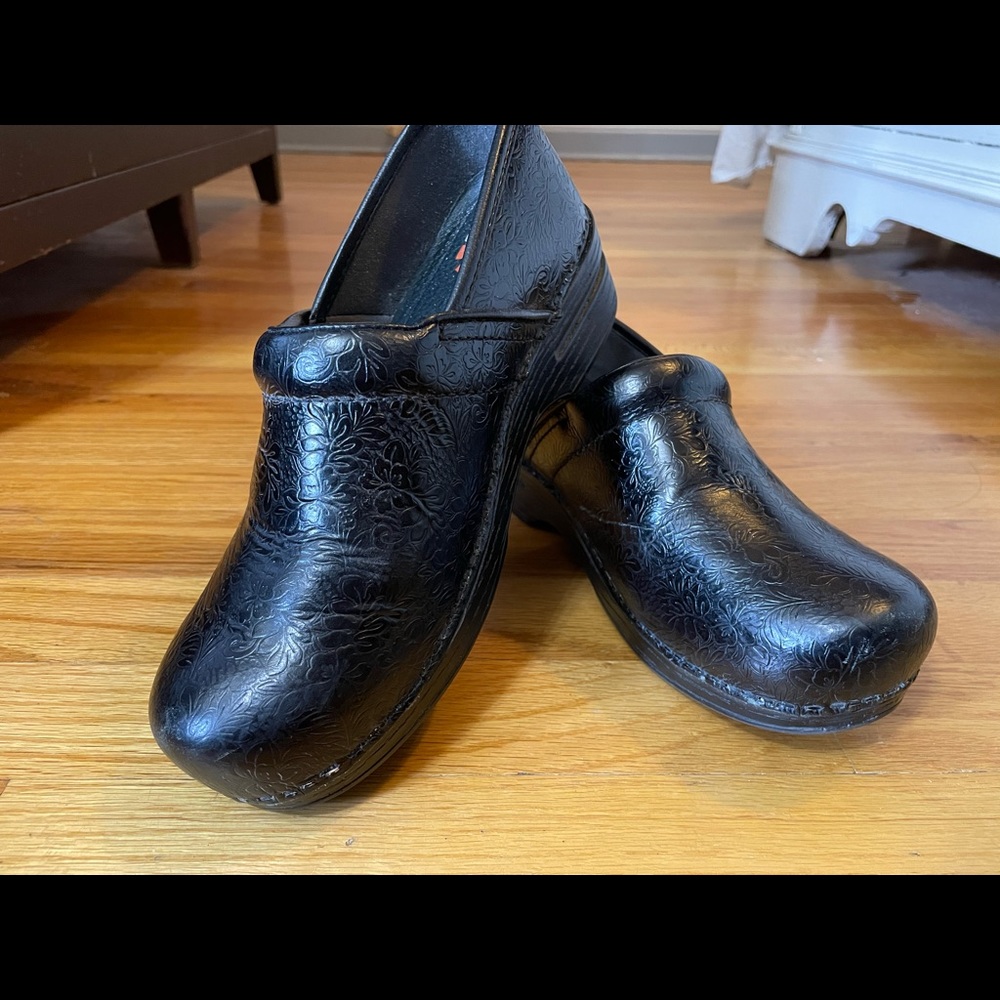 Women’s black clogs